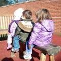 Children on log bench